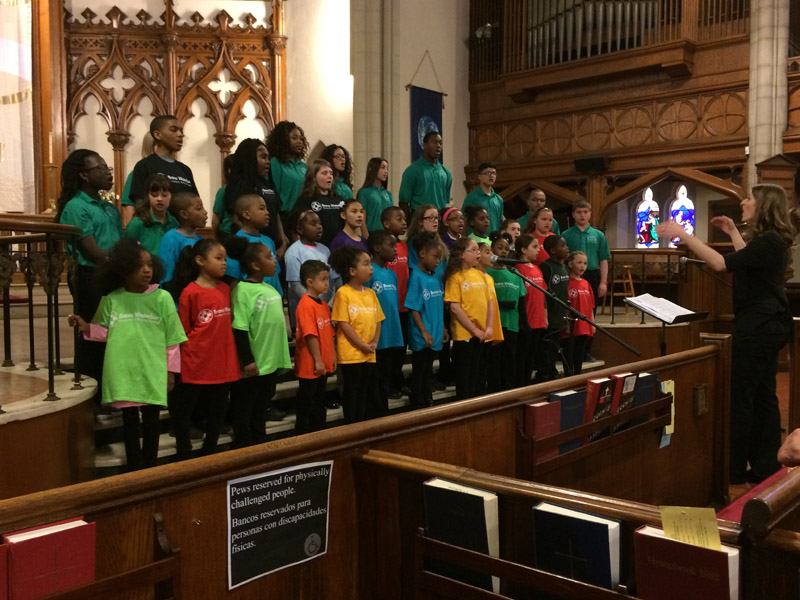 The Waterbury Youth Chorus (green shirts) and Bravo! Waterbury (multicolored shirts) performed a concert together on May 1, 2016